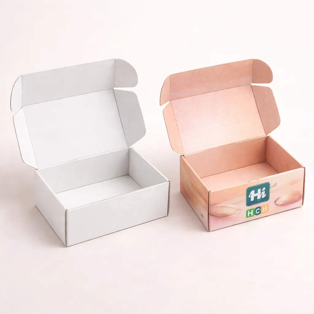 Two drawer-style slide boxes, one plain white and one featuring custom purple eyeshadow base designs. class=